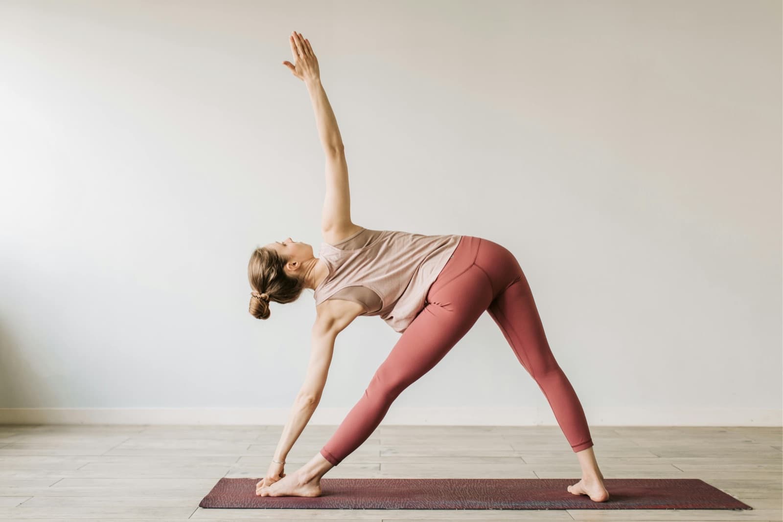 A person moving through a calm practice at home